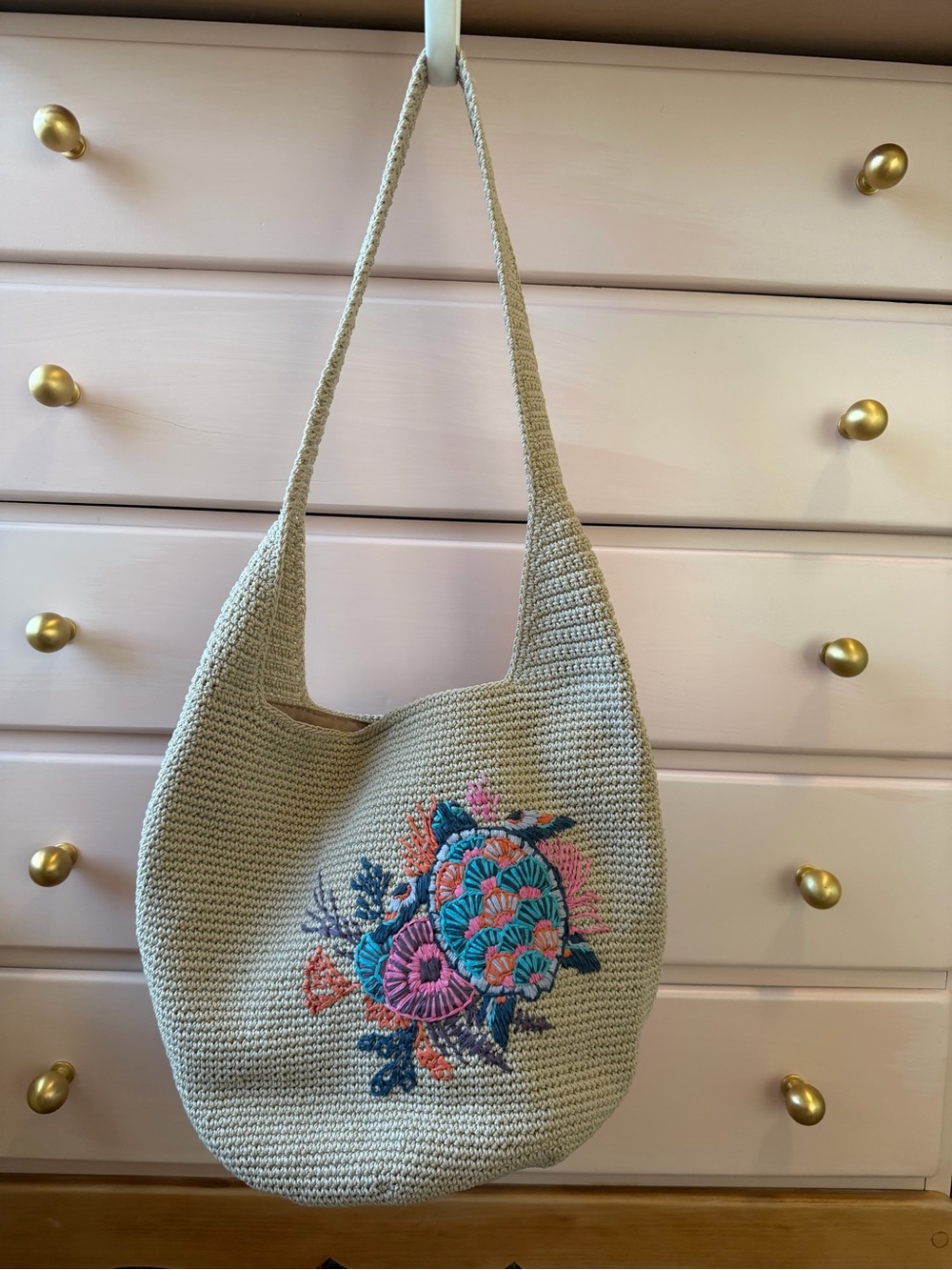 The Sak Beige Crochet Shoulder Bag with Multicolor Floral Embroidery